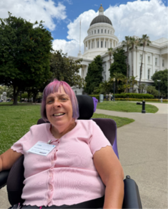 Julie in front of the state capitol