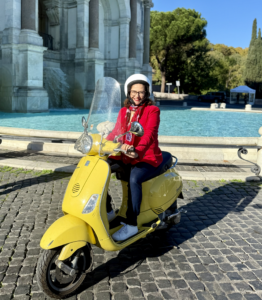 Azucena on a scooter.